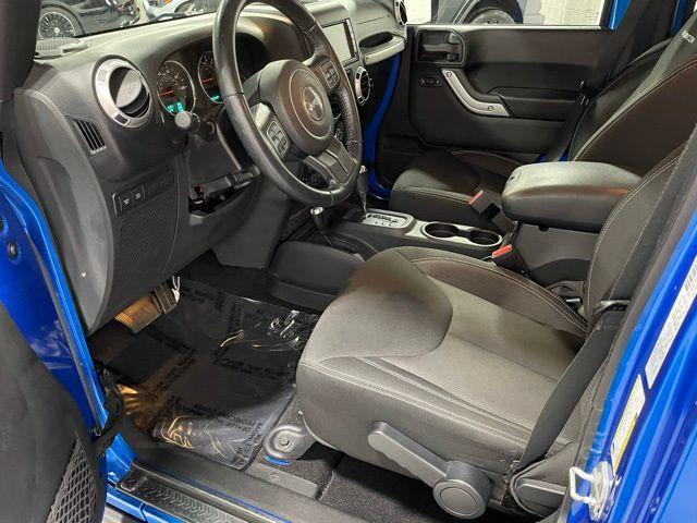Photo of 2016 Hydro Blue Pearl Jeep Wrangler Unlimited