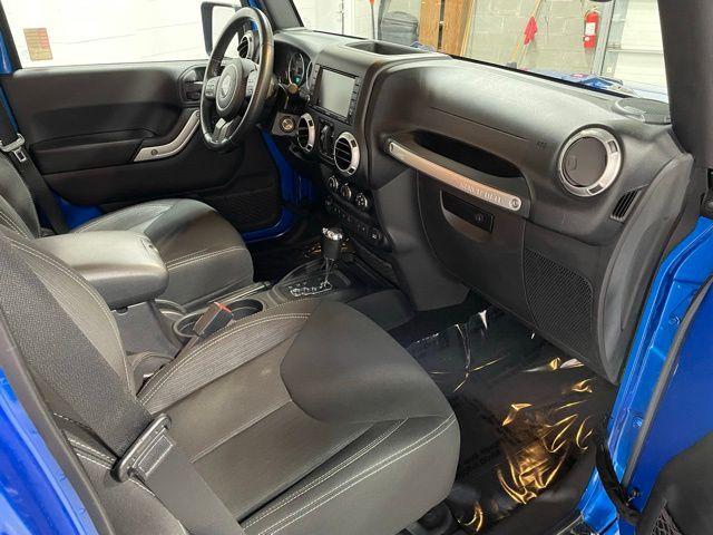 Photo of 2016 Hydro Blue Pearl Jeep Wrangler Unlimited