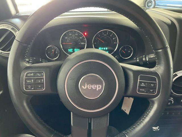 Photo of 2016 Hydro Blue Pearl Jeep Wrangler Unlimited