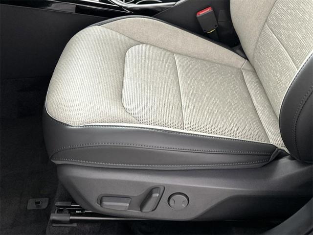 Photo of 2025 Cityscape Green Kia Niro