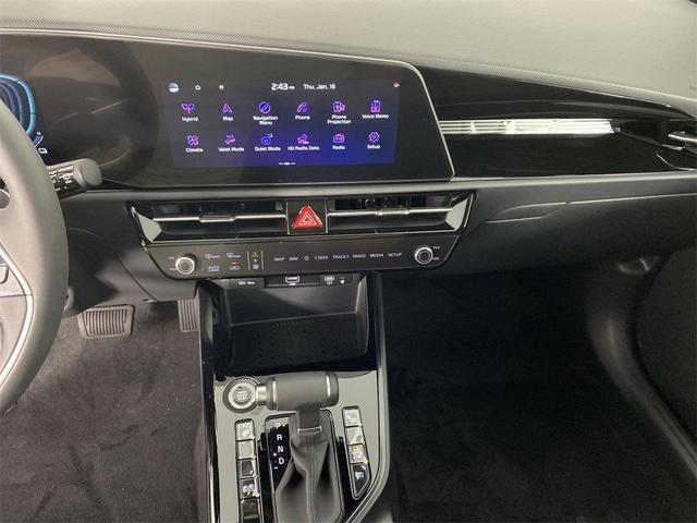 Photo of 2025 Cityscape Green Kia Niro