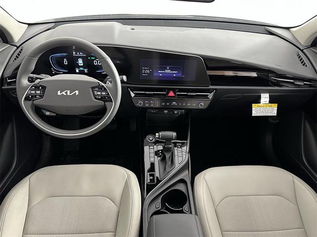 Photo of 2025 Cityscape Green Kia Niro
