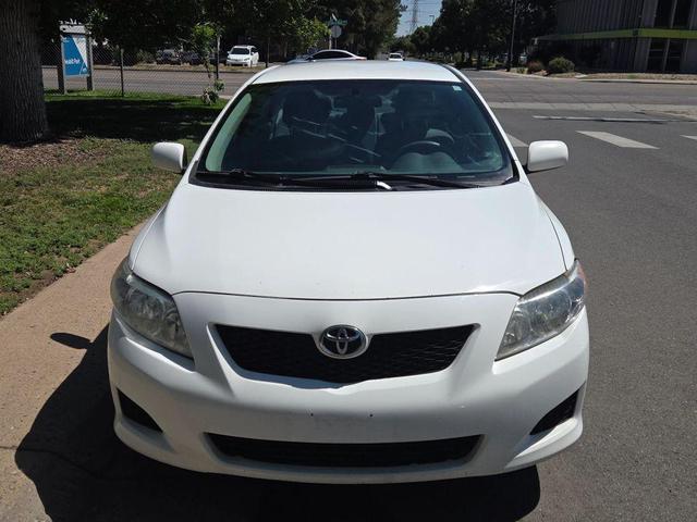 Photo of 2009 Super White Toyota Corolla