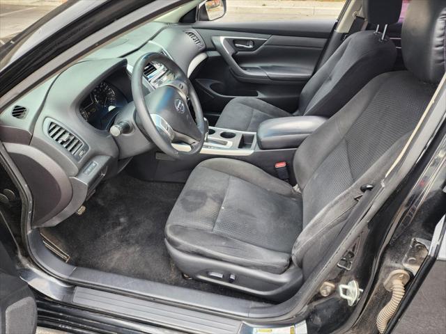 Photo of 2015 Super Black Nissan Altima