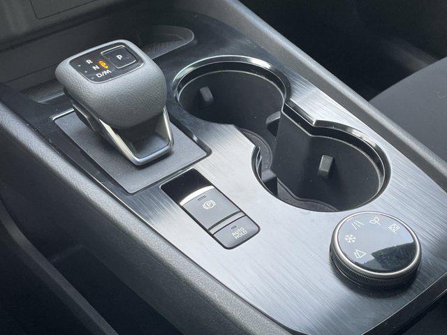 Photo of 2024 Glacier White Nissan Rogue