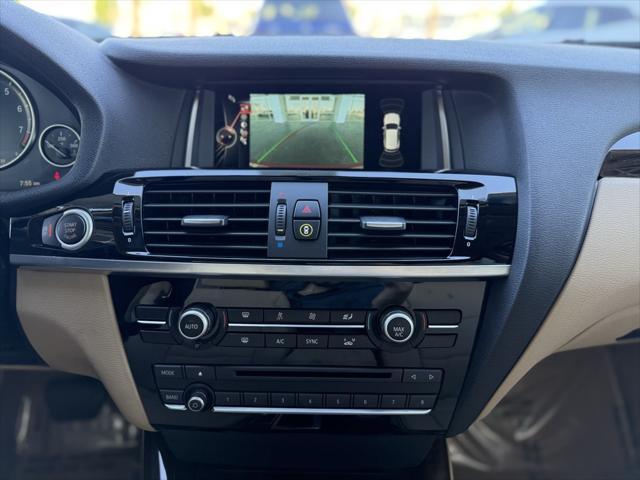 Photo of 2015 Melbourne Red Metallic BMW X3