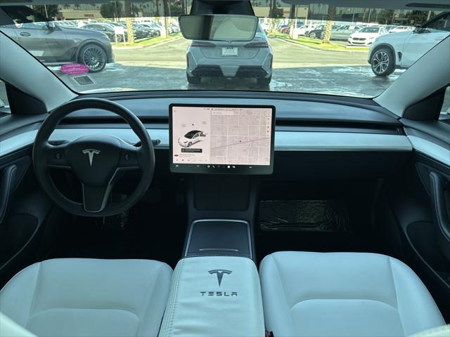 Photo of 2021 Pearl White Multi-Coat Tesla Model 3