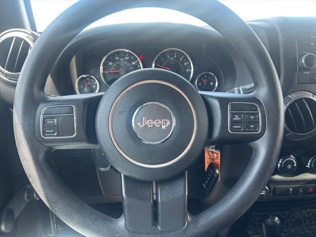 Photo of 2017 Granite Crystal Metallic Clearcoat Jeep Wrangler