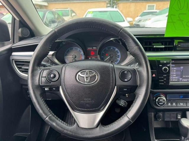 Photo of 2014 White Toyota Corolla