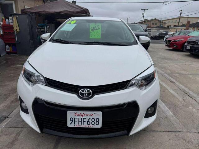 Photo of 2014 White Toyota Corolla