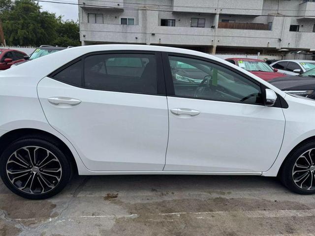 Photo of 2014 White Toyota Corolla