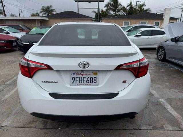 Photo of 2014 White Toyota Corolla