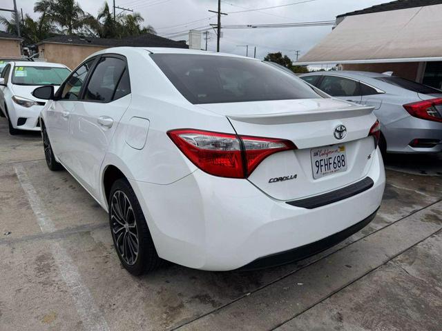 Photo of 2014 White Toyota Corolla
