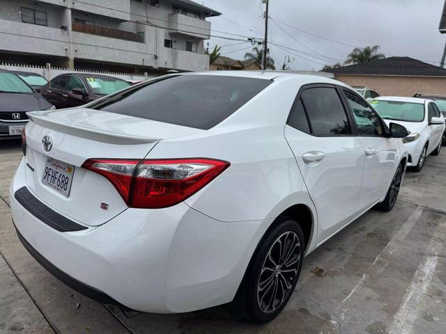 Photo of 2014 White Toyota Corolla