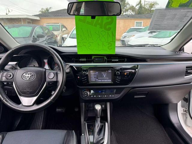 Photo of 2014 White Toyota Corolla