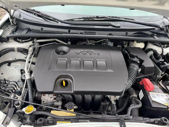 Photo of 2014 White Toyota Corolla