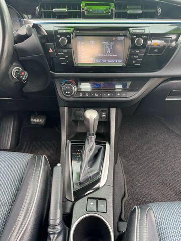 Photo of 2014 White Toyota Corolla