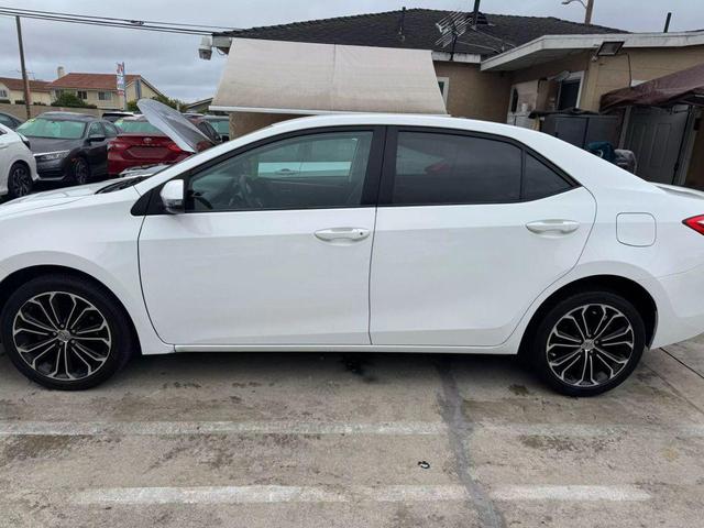 Photo of 2014 White Toyota Corolla
