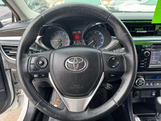 Photo of 2014 White Toyota Corolla