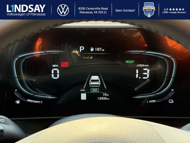 Photo of 2024 Gravity Gray Kia Sportage Hybrid