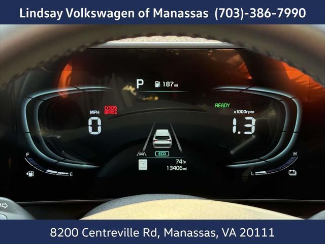 Photo of 2024 Gravity Gray Kia Sportage Hybrid