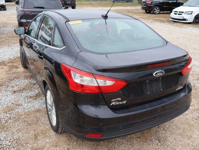Photo of 2012 Ingot Silver Metallic Ford Focus
