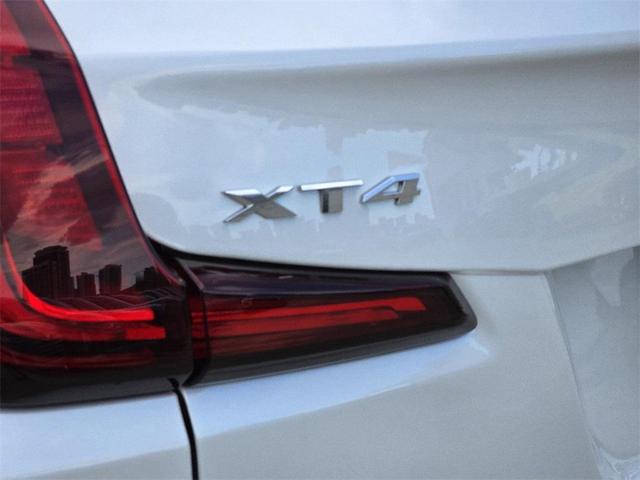 Photo of 2024 Crystal White Tricoat Cadillac XT4