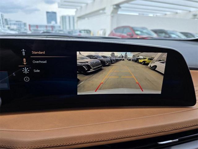 Photo of 2024 Crystal White Tricoat Cadillac XT4