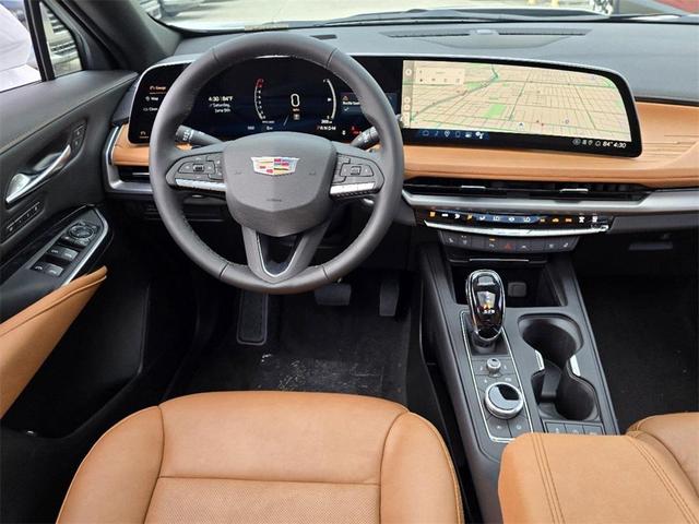 Photo of 2024 Crystal White Tricoat Cadillac XT4