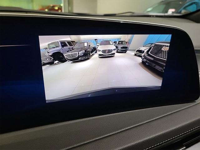 Photo of 2024 Emerald Lake Metallic Cadillac XT4