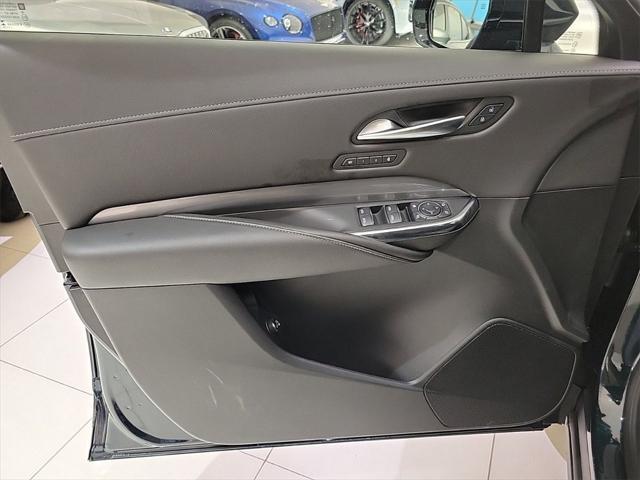 Photo of 2024 Emerald Lake Metallic Cadillac XT4