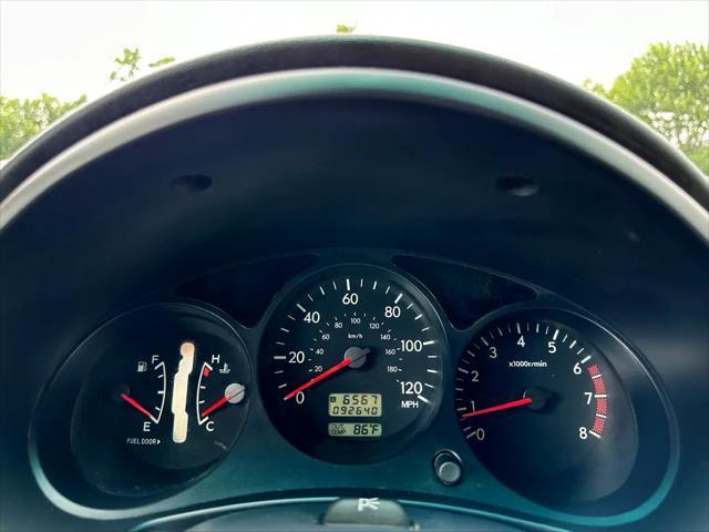 Photo of 2003 Woodland Green Pearl/Textured Gray Subaru Forester