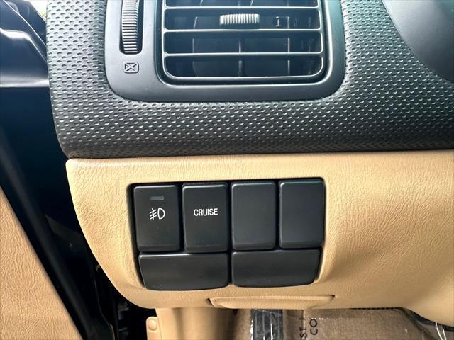 Photo of 2003 Woodland Green Pearl/Textured Gray Subaru Forester