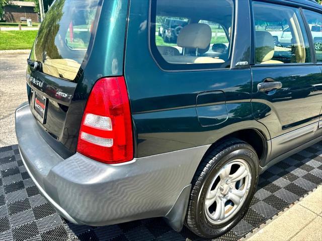 Photo of 2003 Woodland Green Pearl/Textured Gray Subaru Forester
