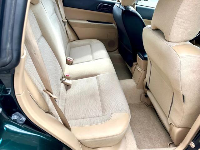 Photo of 2003 Woodland Green Pearl/Textured Gray Subaru Forester
