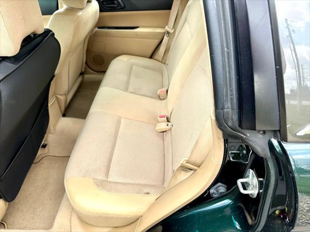 Photo of 2003 Woodland Green Pearl/Textured Gray Subaru Forester