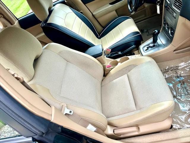Photo of 2003 Woodland Green Pearl/Textured Gray Subaru Forester