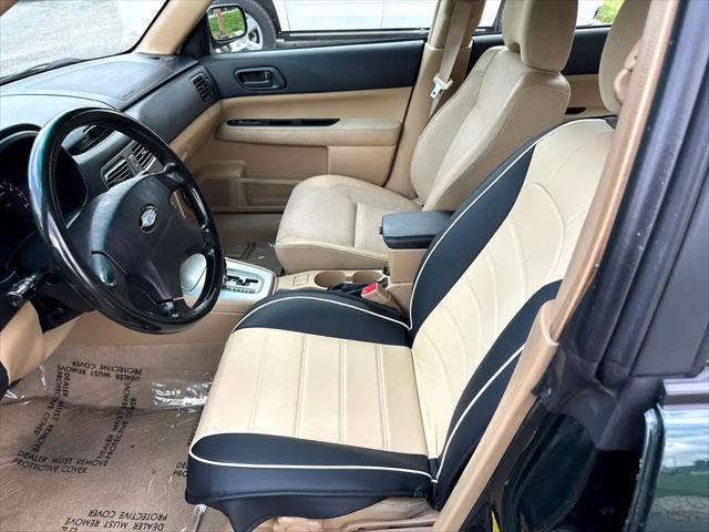 Photo of 2003 Woodland Green Pearl/Textured Gray Subaru Forester