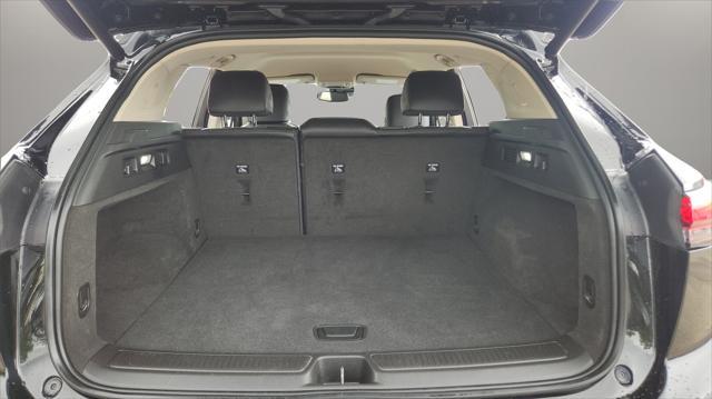 Photo of 2023 Ebony Twilight Metallic Buick Envision