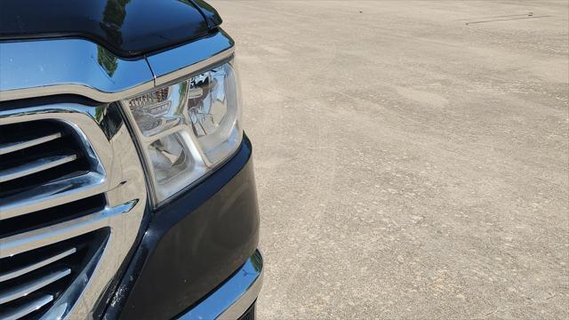 Photo of 2024 Diamond Black Crystal Pearlcoat RAM 1500