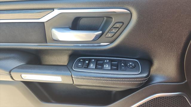Photo of 2024 Diamond Black Crystal Pearlcoat RAM 1500