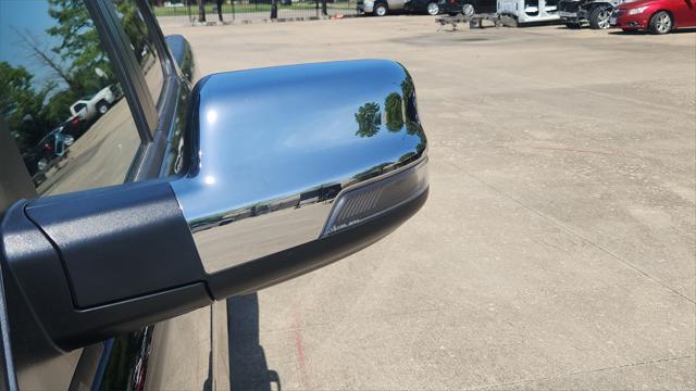 Photo of 2024 Diamond Black Crystal Pearlcoat RAM 1500
