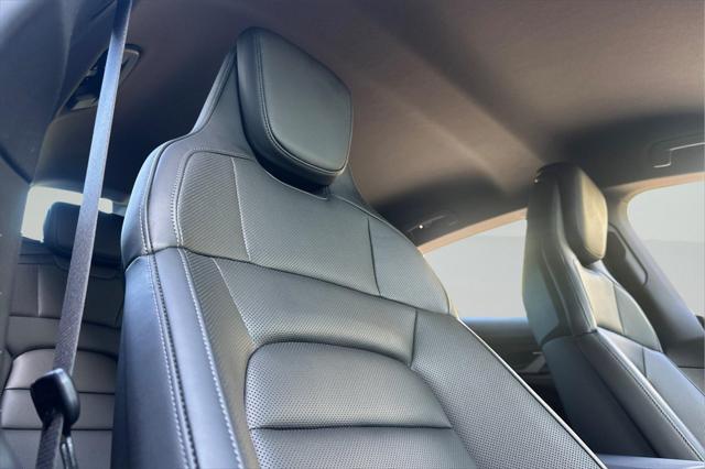 Photo of 2025 Jet Black Metallic Porsche Taycan