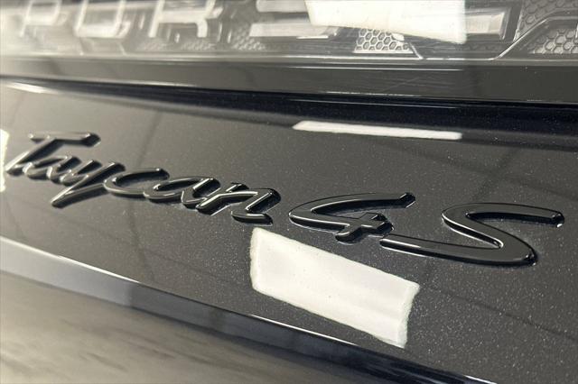 Photo of 2025 Jet Black Metallic Porsche Taycan