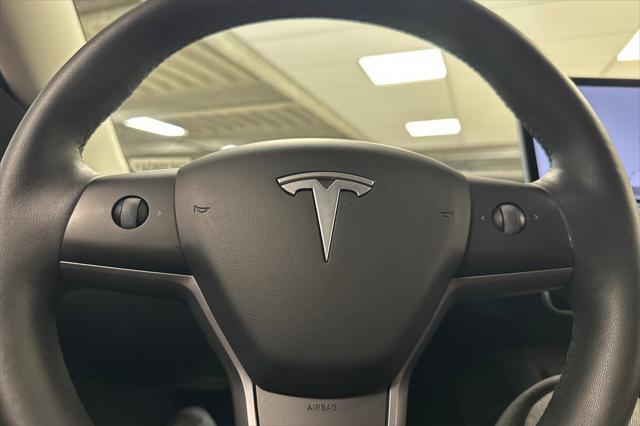 Photo of 2022 Pearl White Multi-Coat Tesla Model 3