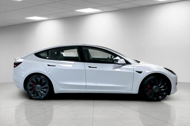 Photo of 2022 Pearl White Multi-Coat Tesla Model 3