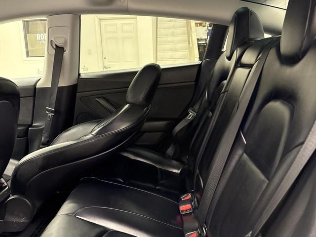 Photo of 2023 Solid Black Tesla Model 3
