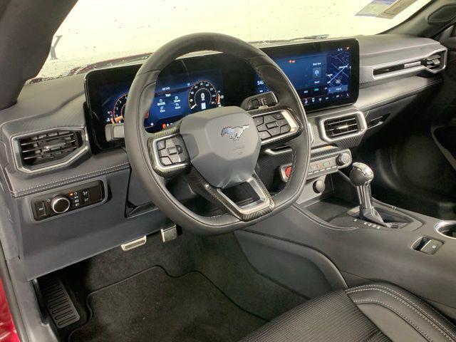 Photo of 2025 Magenta Ford Mustang