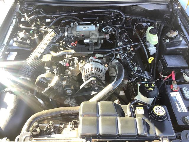 Photo of 2004 Black Ford Mustang