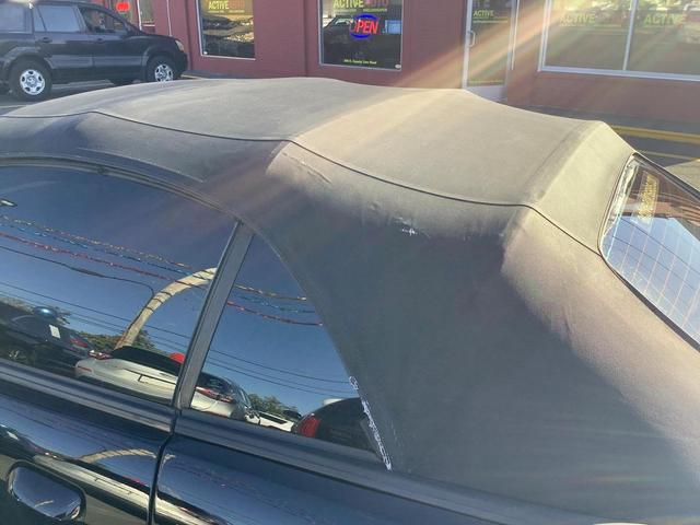 Photo of 2004 Black Ford Mustang